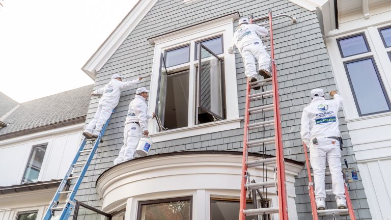 Fox Rock Painting employees painting home's exterior